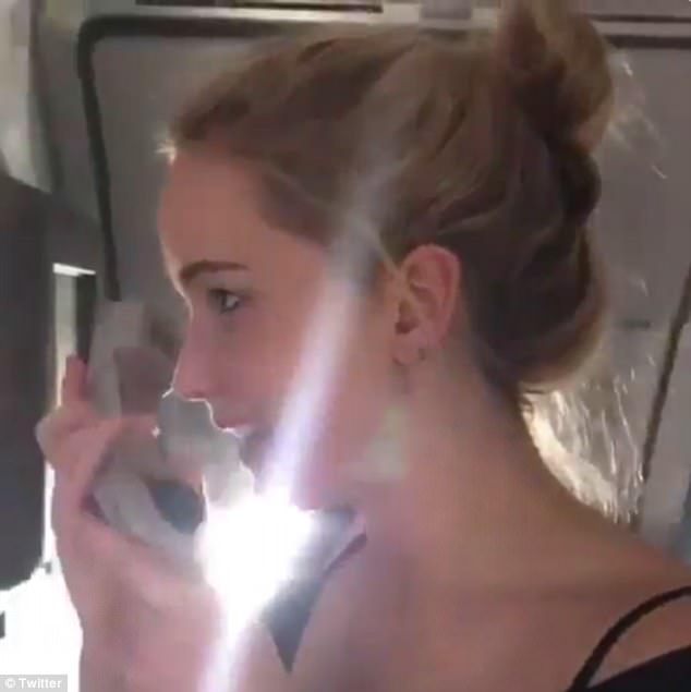 Team spirit: Jennifer Lawrence started off her football Sunday by leading a Delta Air Lines flight in a Philadelphia Eagles chant while hijacking the loudspeaker