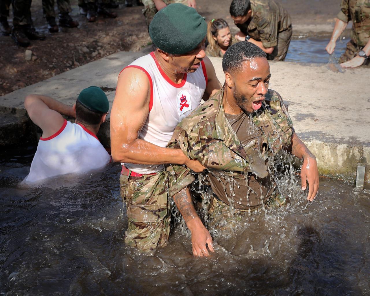 Raheem Sterling being put through his paces by the Royal Marines