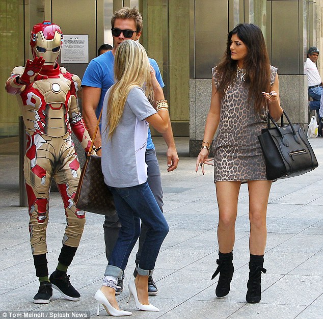 More her age: Kylie was seen out earlier in the day with Jaden Smith, left, who dressed up in an Iron Man suit
